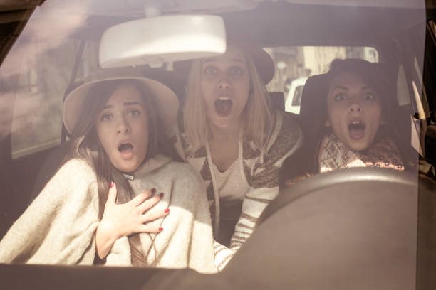 istock Car crash. Three girls tried to avoid the car accident. 843594376