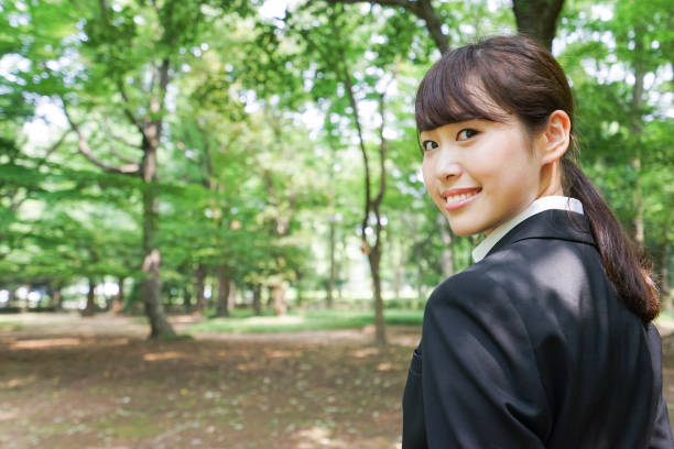 istock Young business woman smiling with suit 843595600