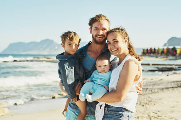 istock Bonding with our beautiful children on the beach 843595784