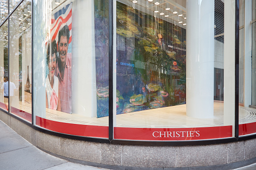 New York - September 12, 2016: Christie's American branch window in Rockefeller Center in New York. It is a British auction house founded in 1766.