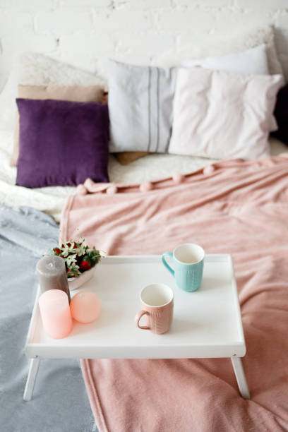 istock Breakfast in bed. Bedroom in pastel colors 843598646