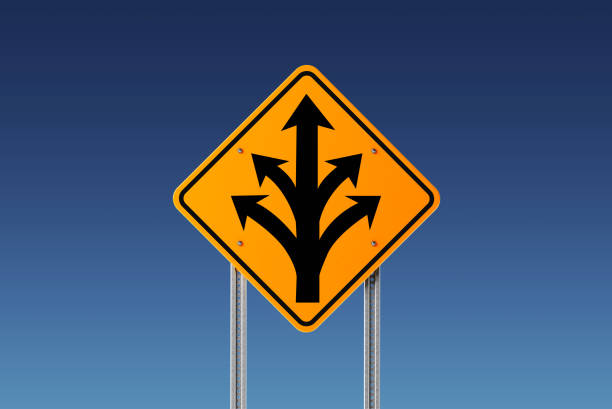 istock Yellow Branching Off  Traffic Sign on Blue Sky 843600460