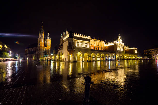 11 of July 2017-Poland, Krakow. Market Square at night.The Main Market Square in Cracow is the most important square of the Old Town in Cracow,Sukiennice, the Cloth Hall - a landmark of Rynek 11 of July 2017-Poland, Krakow. Market Square at night.The Main Market Square in Cracow is the most important square of the Old Town in Cracow,Sukiennice, the Cloth Hall - a landmark of Rynek wawel cathedral photos stock pictures, royalty-free photos & images