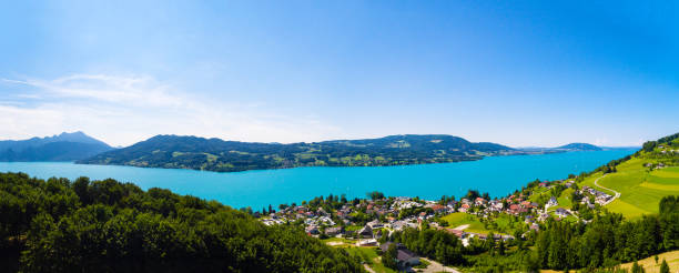 AERIAL view of Attersee lake,  Attersee, Upper Austria, Austria View of Attersee is the largest lake of the Salzkammergut region in the Austrian state of Upper Austria attersee stock pictures, royalty-free photos & images