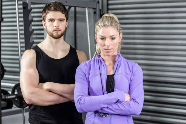 istock Fit couple with arm crossed 843606862
