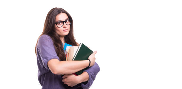 istock Attractive young student with lots of books 843607496