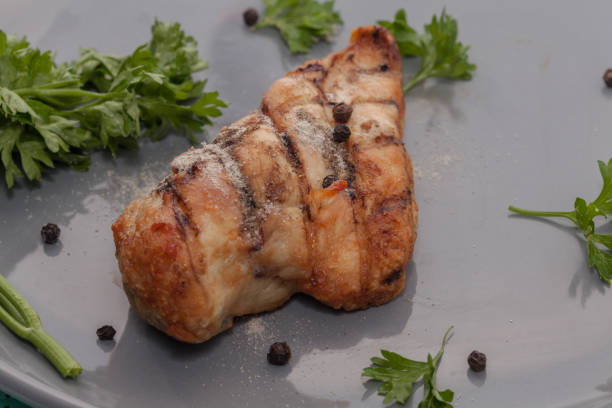istock grilled chicken breast on plate 843611688