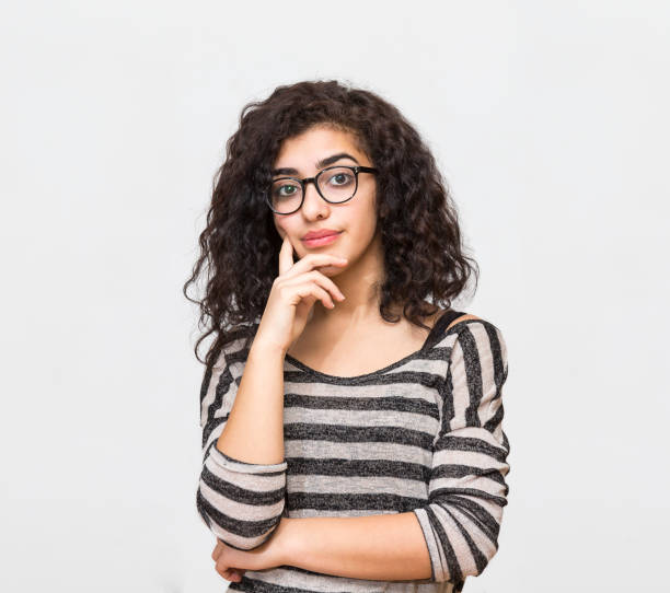 istock young woman facial expressions 843616996