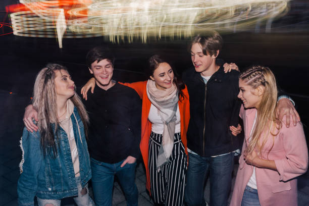 istock Friends night party. Blurred background 843617240