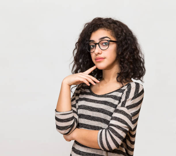 istock young woman facial expressions 843618302