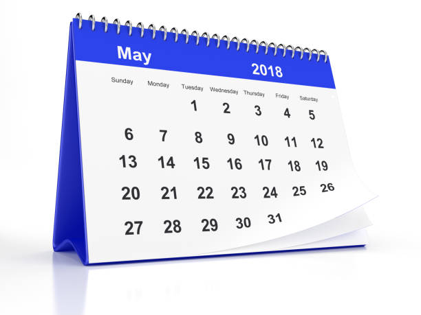 istock May 2018 Blue Plastic Framed Desktop Calendar on White Background 843631024