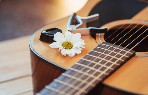 istock Photography classical guitar on a light brown background 843634410