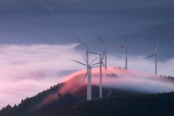 renewable energy with wind turbines stock photo