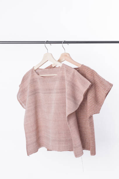 istock cotton brown stripe woman blouse on white background. 843634592