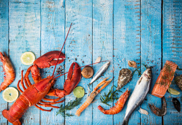 istock Fresh tasty seafood served on old wooden table 843635836