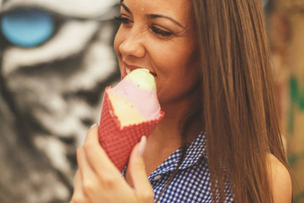 istock Beautiful woman with ice cream 843635936