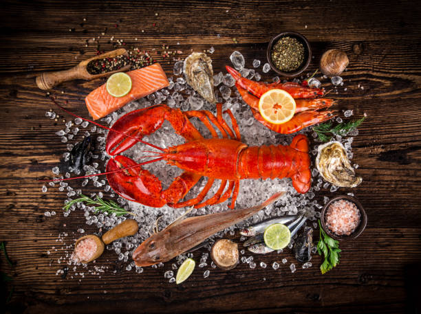 istock Fresh tasty seafood served on old wooden table 843640396