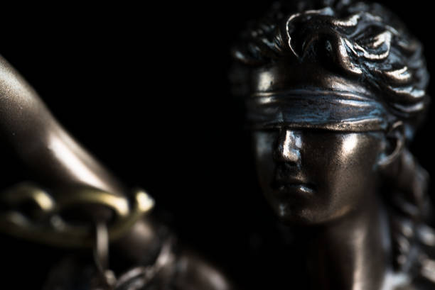 istock Law and Justice symbols on dark background 843649188