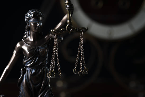 istock Law and Justice symbols on dark background 843649256