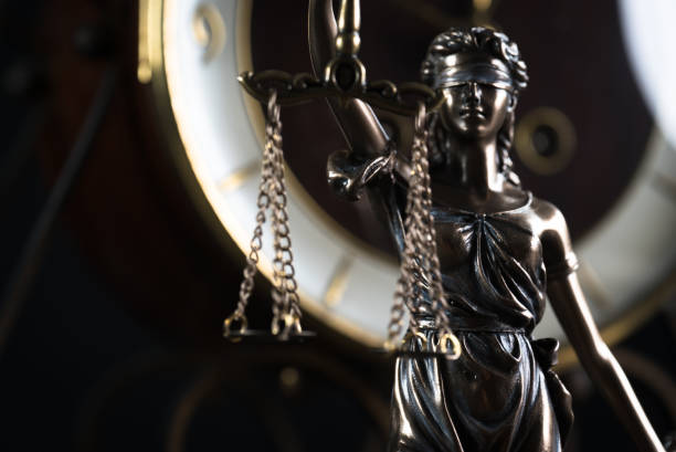 istock Law and Justice symbols on dark background 843649308