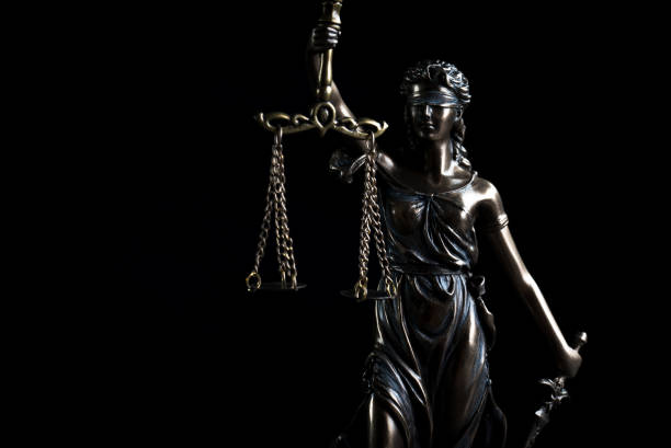 istock Law and Justice symbols on dark background 843650076