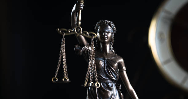 istock Law and Justice symbols on dark background 843650114
