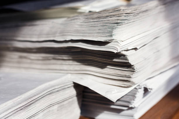 istock Pile of wrapping paper on wooden table 843653110