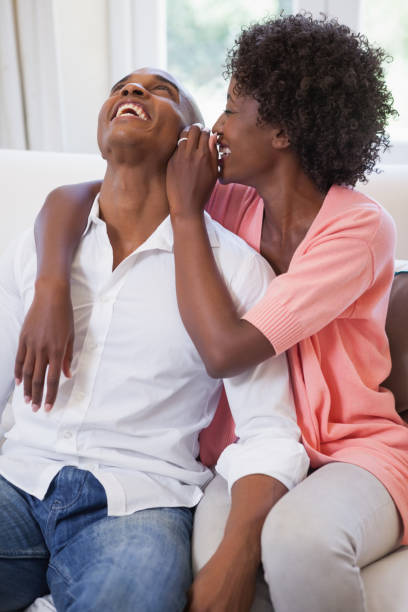 istock Happy couple relaxing on the couch 843657206