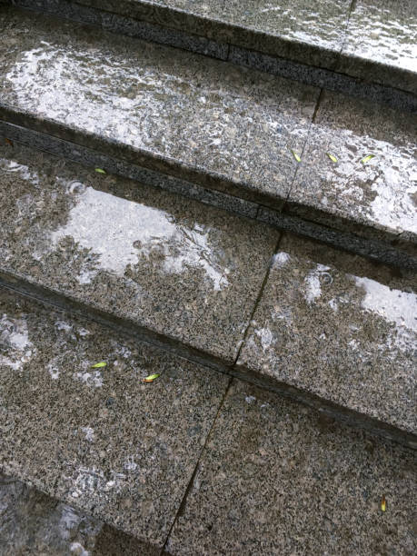 istock raindrops on granite steps of outdoor staircase during rainy day 843658304