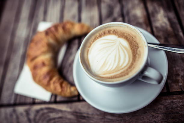 istock Cappuccino with croissant 843663056