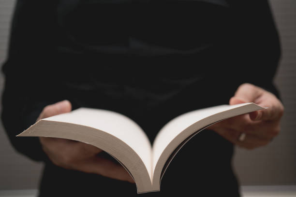 istock male hands holding a blank white notebook mock-up 843665986