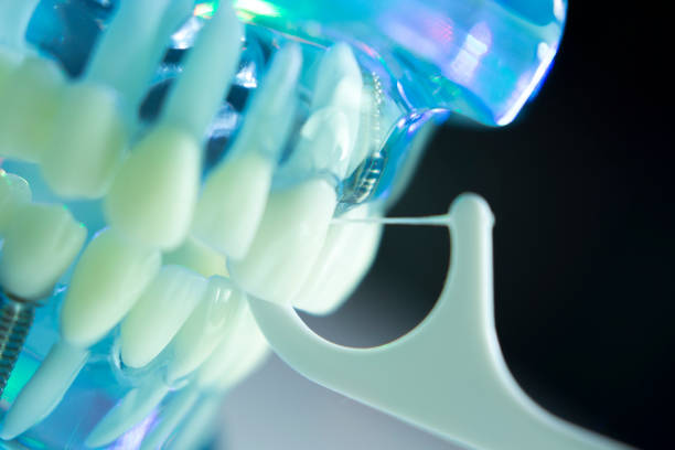 istock Dental floss interdental cleaning teeth 843673326