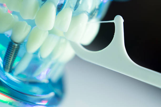 istock Dental floss interdental cleaning teeth 843673358