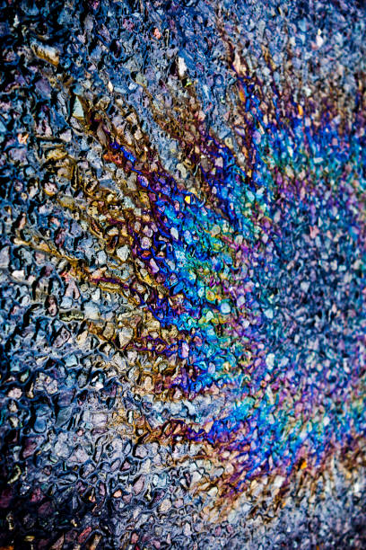 istock Metallic Rainbow Petrol Spill on Pavement Sidewalk 843676030