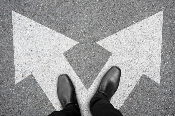 istock Businessman making decision at the crossroad 843681392
