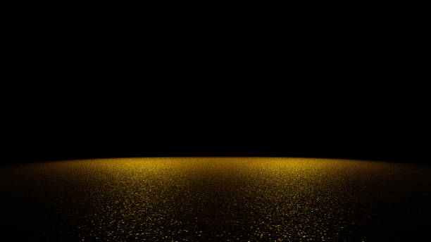 istock sparkling golden glitter on a flat surface lit by two bright spotlights 843686478