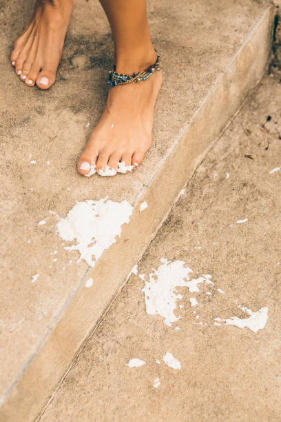 istock girl drop her cool icecream on stairs. 843686490