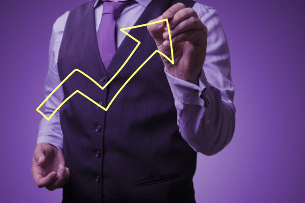 istock businessman draws an big growing arrow 843689068