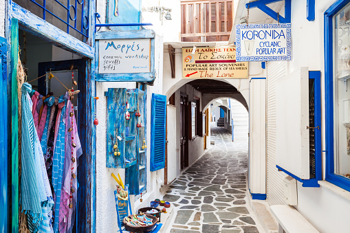 NAXOS ISLAND, GREECE - OCTOBER 24, 2016: Souvenir stores in Naxos Kastro old town, Naxos island in Greece