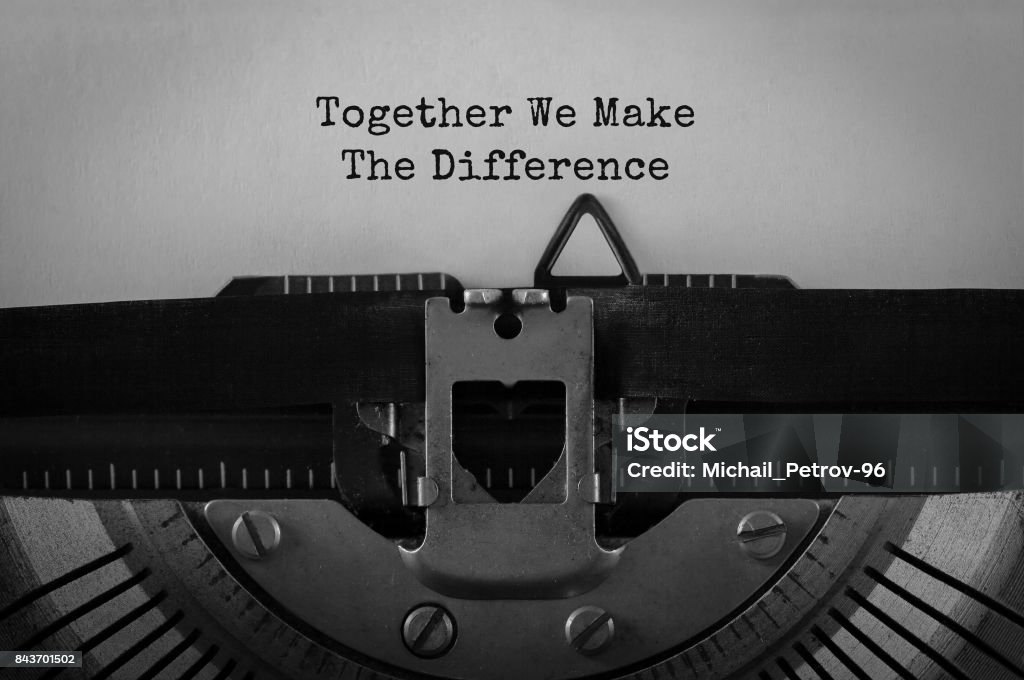 Text Together We Make The Difference typed on retro typewriter Charity Benefit Stock Photo