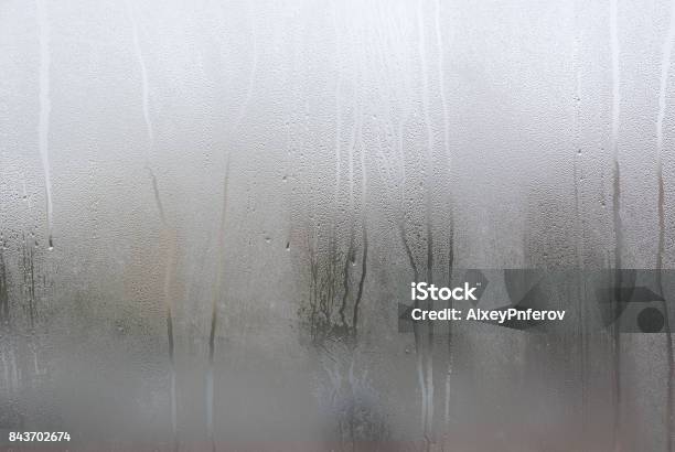 Window With Condensate Or Steam After Heavy Rain Large Texture Or Background Stock Photo - Download Image Now