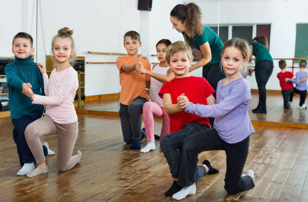 istock Children studying of partner dance  at dance school 843705794