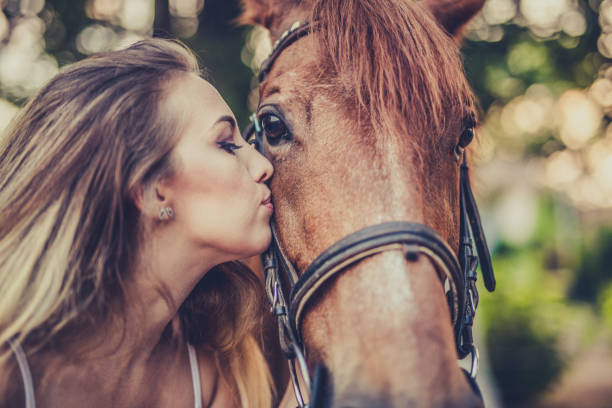 istock Kissing a horse 843706408