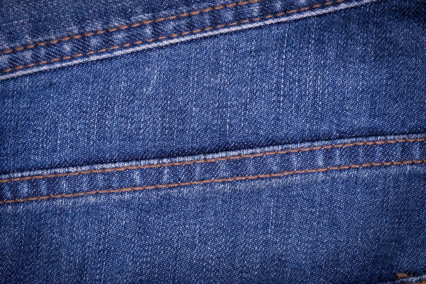 istock Texture of blue jeans background 843717466