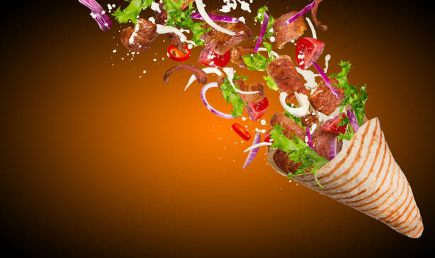 istock Kebab sandwich with flying ingredients 843721382