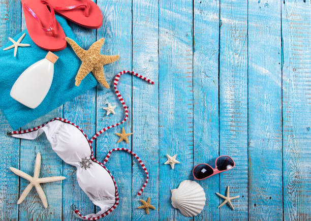 istock Beauty bikini and accessories on rustic wooden table 843732668