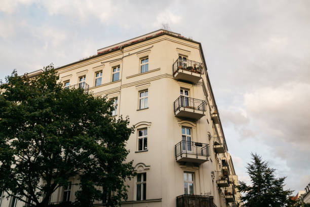 istock yellow corner house on cloudy day in berlin 843733214