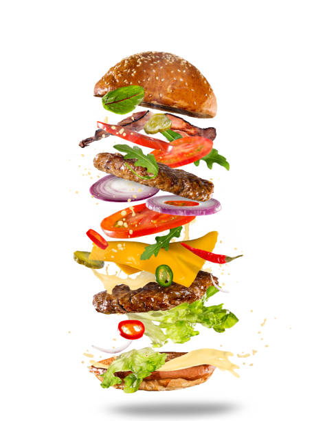 istock Big tasty burger with flying ingredients 843735900