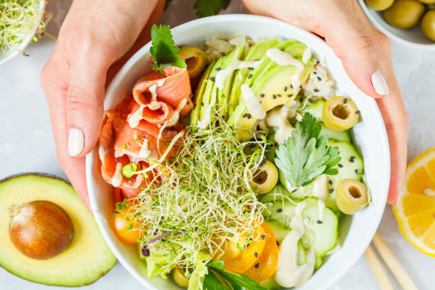 istock salmon poke with rice, avocado and sprouts. 843747558