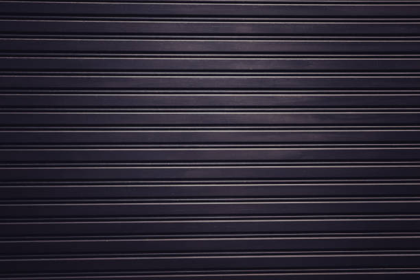 istock Metal curtain door texture realistic dark light gradient background wallpaper texture 843748866